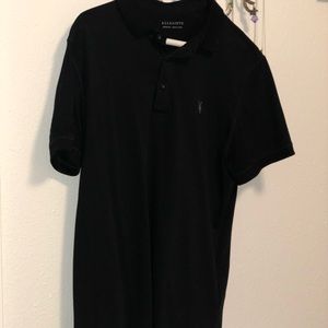 a pair of All Saints polo shirts